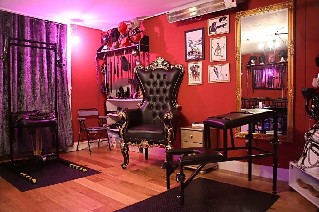 The Bayswater Dungeon in West London: red walls, a black throne and bondage furniture
